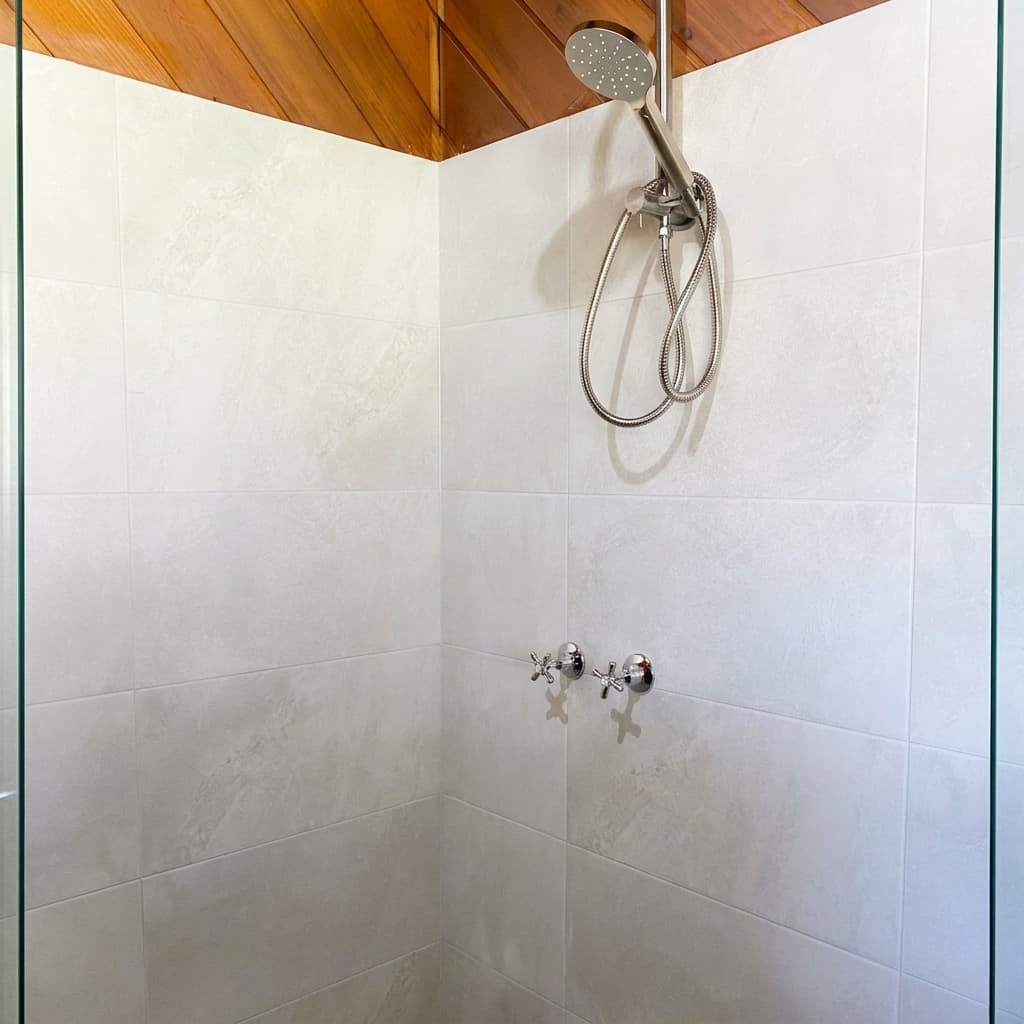 Walk-in Shower with Timber Ceiling & Chrome Fixtures